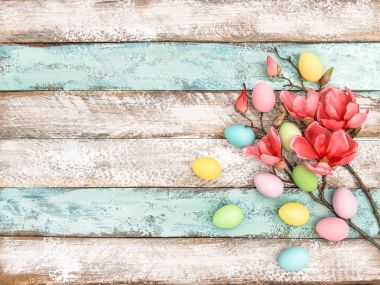 Easter eggs flowers decoration wooden background