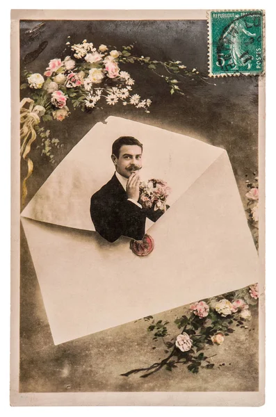 Giovane uomo rosa fiori francese biglietto di auguri — Foto Stock