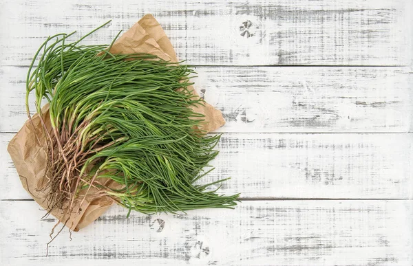 Zielone warzywa agretti drewniane kuchnia tabeli żywności tło — Zdjęcie stockowe