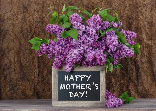 Mothers Day Lilac flowers vintage chalkboard — Stock Photo, Image