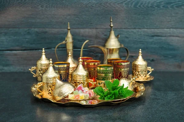 Oriental tea coffee table golden dishes delight mint Ramadan — Stock Photo, Image