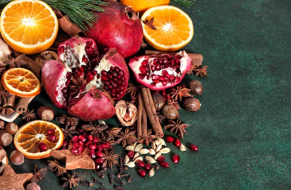 Fruits pomegranate orange spices ingredients mulled wine — Stock Photo, Image