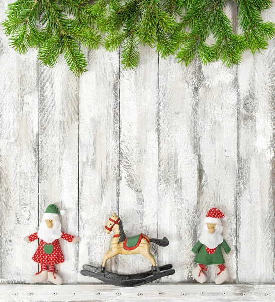 クリスマスおもちゃ装飾素朴な木製の背景 — ストック写真