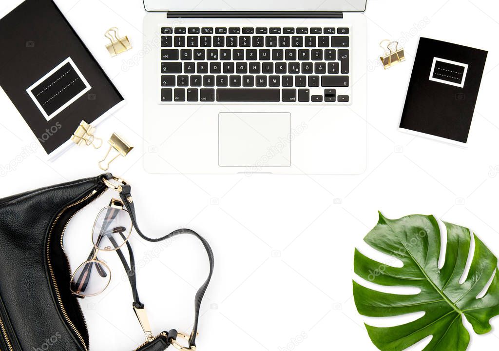 Office desk Notebook green leaf Fashion flat lay social media