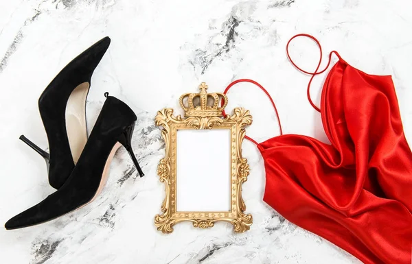 Fashion flat lay Red dress black high heels golden frame — Stock Photo, Image