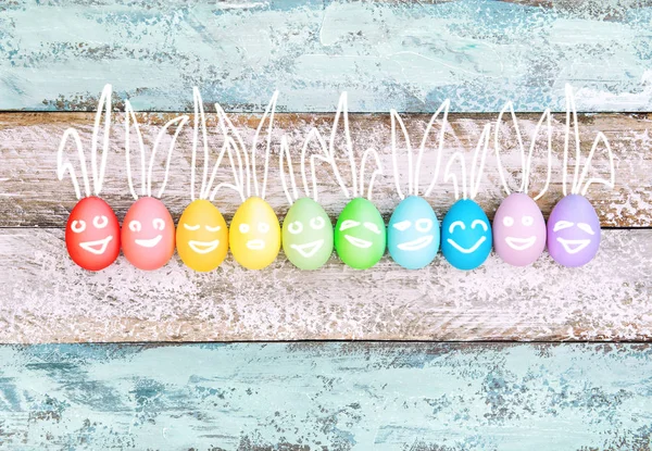 Funny bunnies smiling easter eggs decoration — Stock Photo, Image