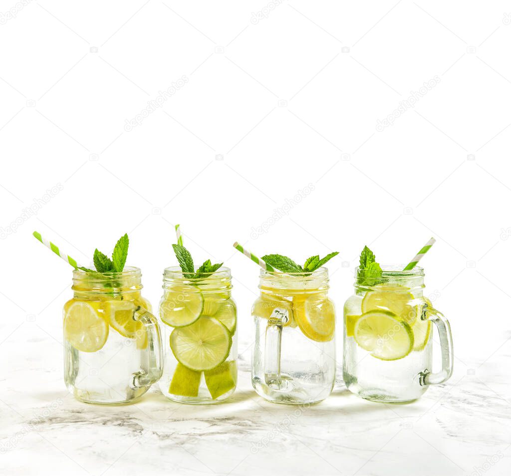 Drink with lime, lemon, mint and ice. Cold summer cocktail lemonade