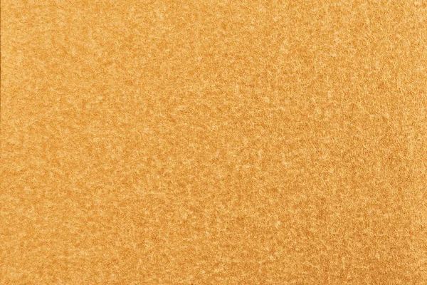 Gold paper with abstract texture for background.