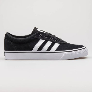 VIENNA, AUSTRIA - 14 Şubat 2018: Adidas Adi Ease beyaz arka planda siyah ve beyaz spor ayakkabıları.