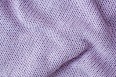 Lilac knitting wool texture background. clipart