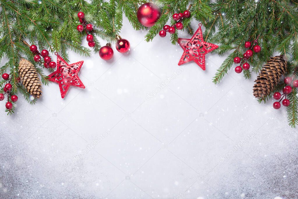 Christmas background with fir tree and red gifts. Top view Copy space Snow effects