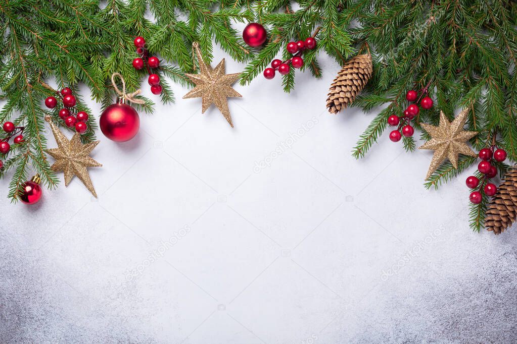 Christmas background with fir tree, red and gold gifts. Top view Copy space