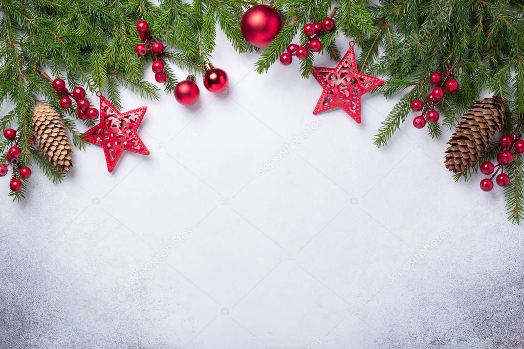 Christmas background with fir tree and red gifts. Top view Copy space