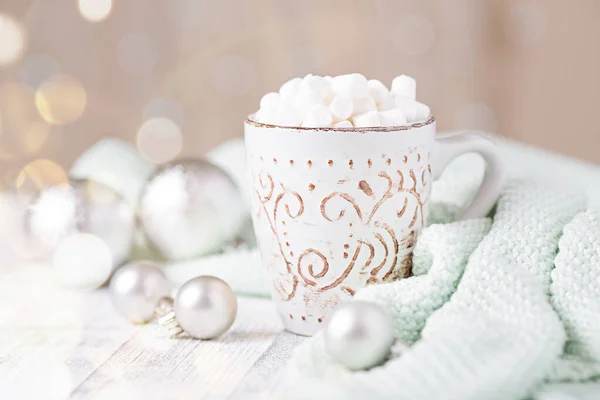 Mug with coffee and marshmallow, sweater, cinnamon. Cozy christmas composition. Hygge concept Soft focus — Stock Photo, Image