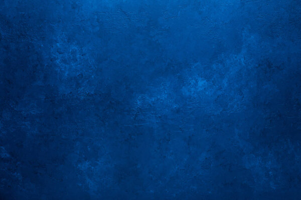 Old stone texture background toned classic blue color Copy space