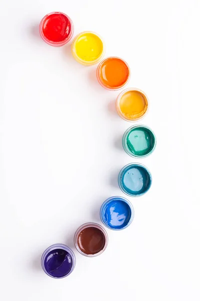 Multicolored Gouache White Background Rainbow Shape Isolated Paints Containers Top — Stock Photo, Image