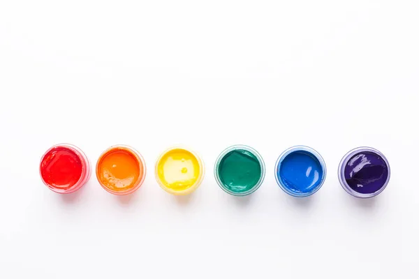 Six Jars Paint White Background Isolated Multicolored Gouache Top View — Stock Photo, Image