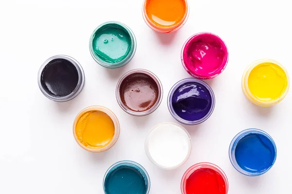 Multicolored Gouache White Background Isolated Paints Containers Top View Copy — Stock Photo, Image