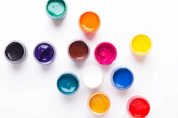 Multicolored Gouache White Background Isolated Paints Containers Top View Copy — Stock Photo, Image