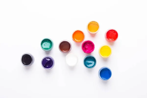 Multicolored Gouache White Background Isolated Paints Containers Top View Copy — Stock Photo, Image