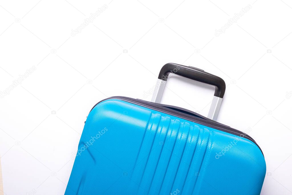 Blue suitcase on white background Summer holidays, vacation, travel concept Minimal Copy space