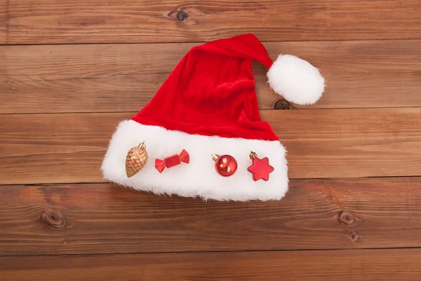 Hat of Santa Claus with Christmas toys — Stock Photo, Image