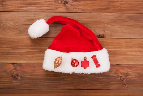 Hat of Santa Claus with Christmas toys — Stock Photo, Image