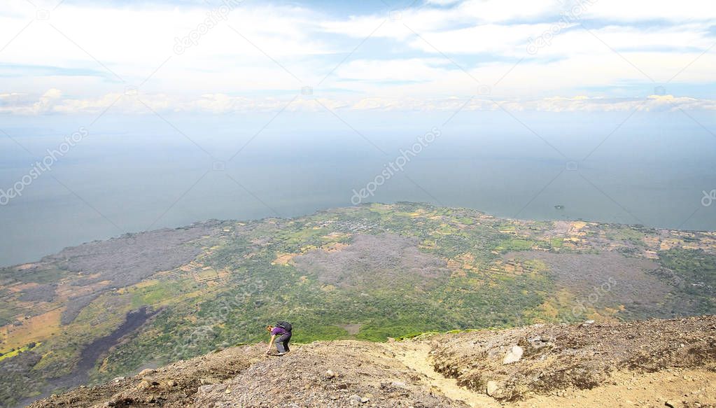 A hiker climbs up Volcan Concepcion on the island of Ometepe, Nicaragua