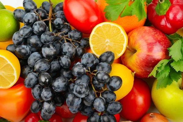 Beau fond d'un ensemble de légumes et de fruits — Photo