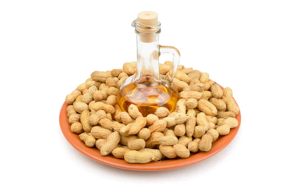 Peanuts and vegetable oils isolated on white background. — Stock Photo, Image