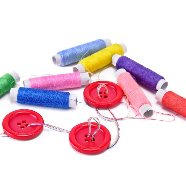 Sewing thread and buttons isolated on white background. — Stock Photo, Image