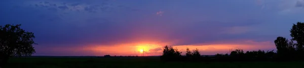Panorama západ slunce nad polem — Stock fotografie