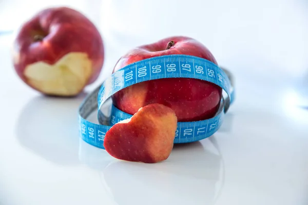 Healthy eating apple with heart shaped, isolated, close up