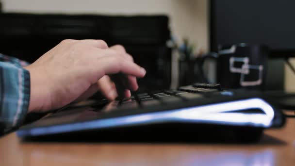 Man Typing Modern Illuminated Computer Keyboard — Stock Video