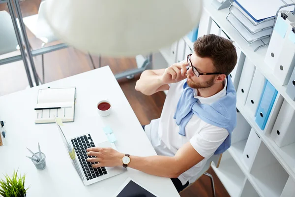 Young designer working at office — Stock Photo, Image