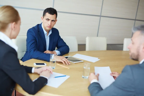 Serious manager during discussion — Stock Photo, Image