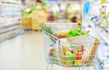 shopping cart with different food  clipart