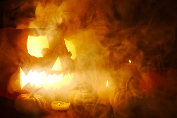 Scary jack-o-lantern in mist — ストック写真