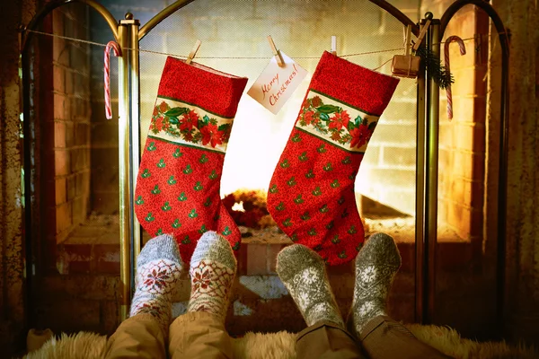 Human feet in woolen socks in Christmas — Stock Photo, Image