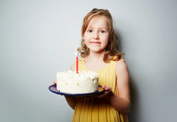 Pretty youngster holding birthday cake — ストック写真