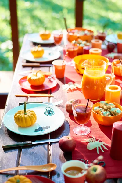 Table with traditional Halloween food — Stock Photo, Image