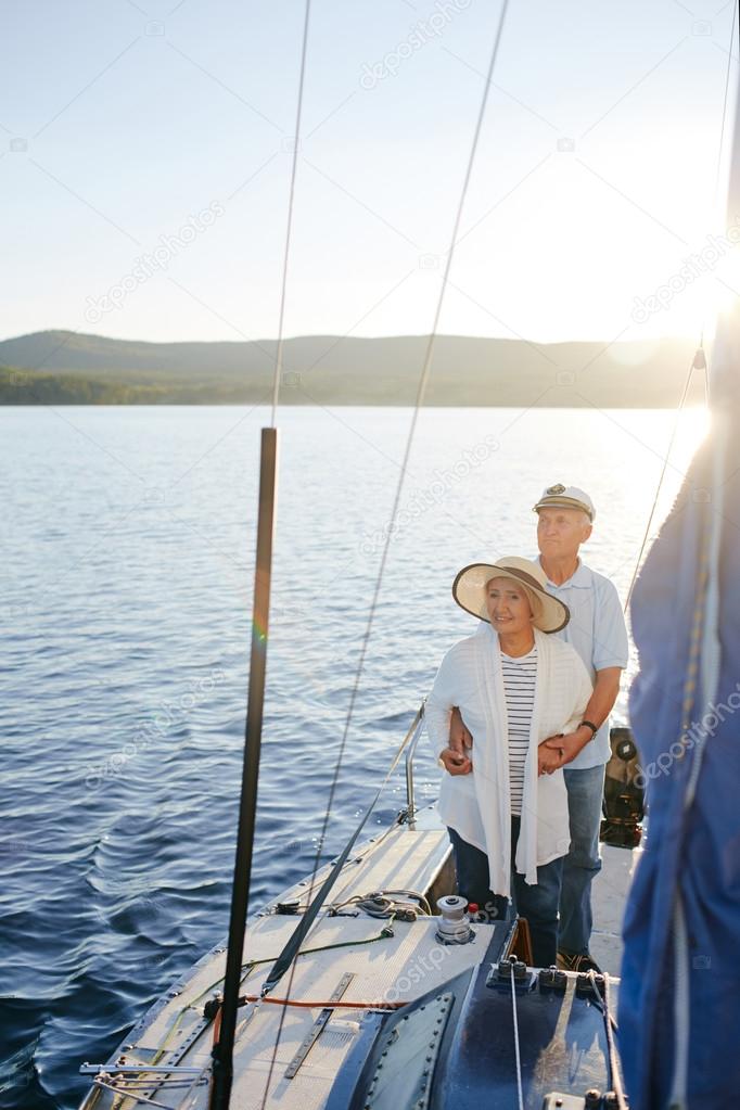 Romantic senior couple on luxurious yacht