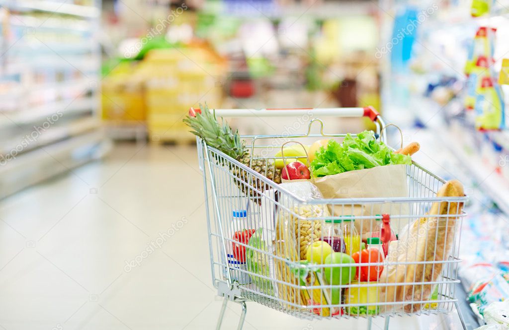 shopping cart with different food 