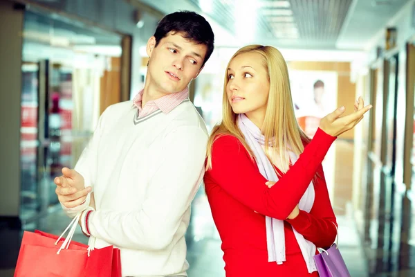 Woman asking her husband to buy one thing — Stock Photo, Image