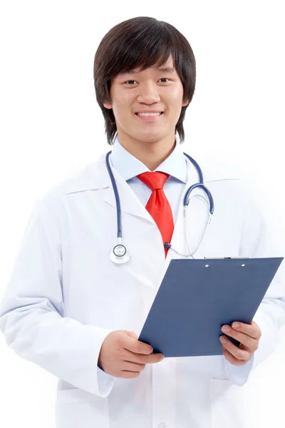 Young doctor looking at camera and smiling — Stock Photo, Image