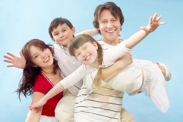 Happy family posing at camera — Stock Photo, Image