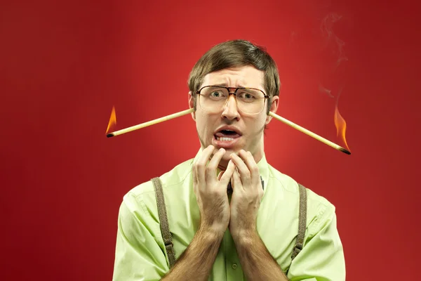 Típico nerd con palos ardiendo en las orejas —  Fotos de Stock