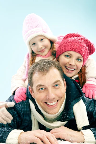 Happy family looking at camera — Stock Photo, Image