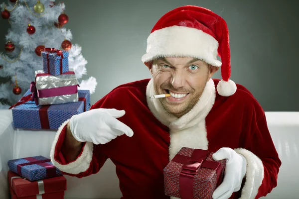 Wicked Santa Claus smoking a cigarette — Stock Photo, Image