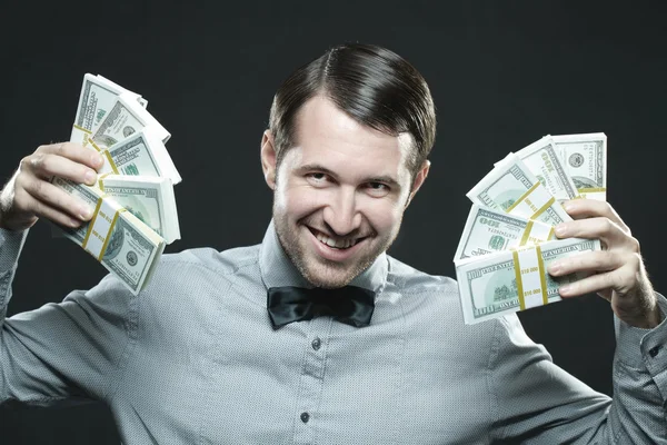 Ευτυχισμένος άνθρωπος εκμετάλλευση χρήματα — Φωτογραφία Αρχείου